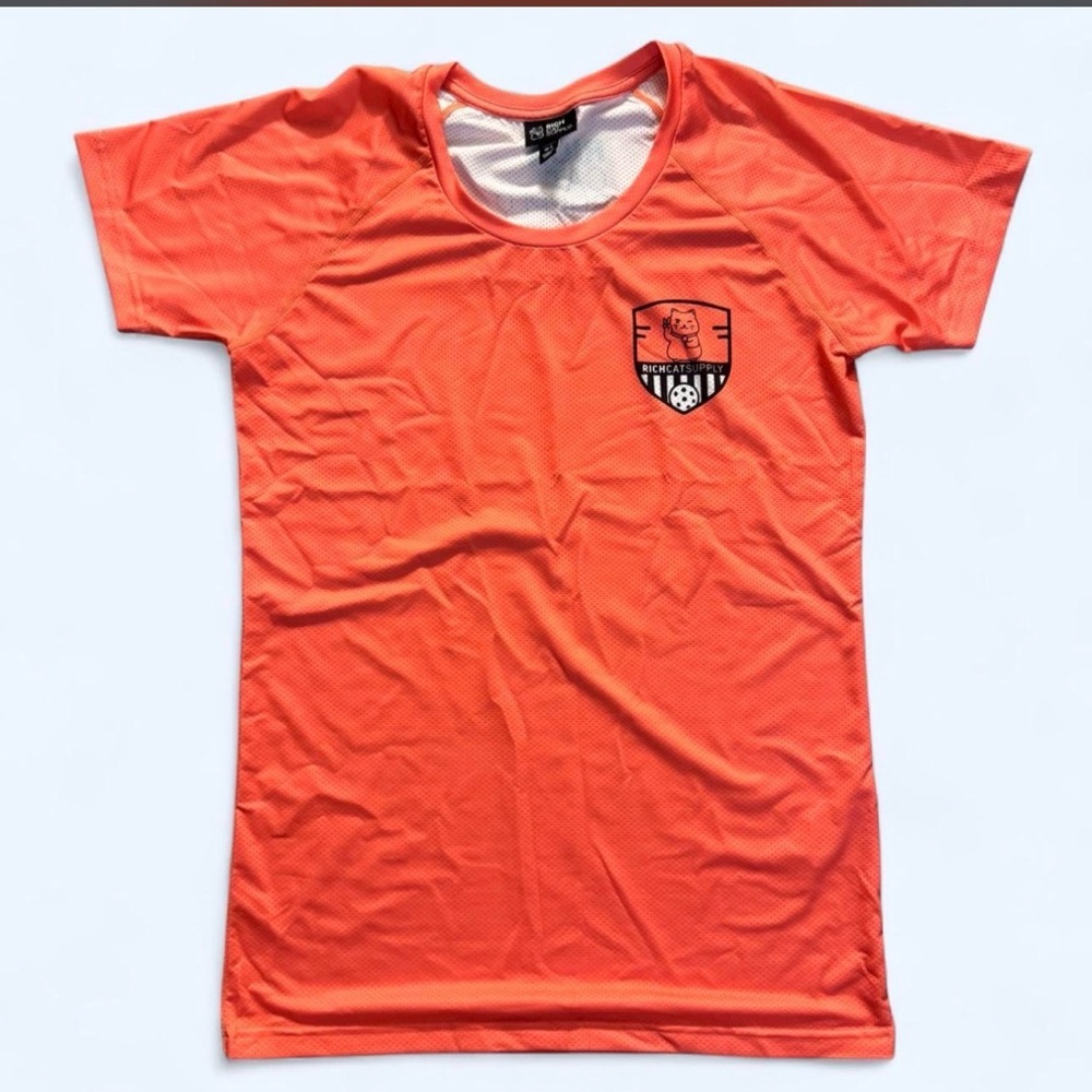 Women's Short Sleeve Performance Tee in Orange with Crest